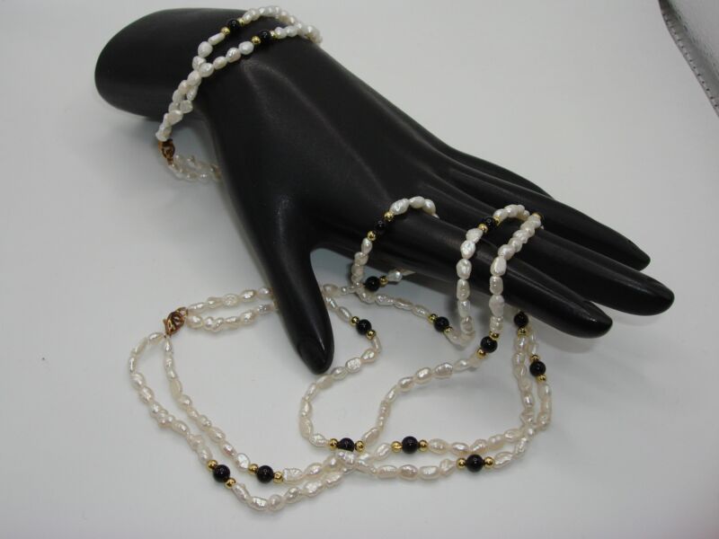 Vintage creamy white freshwater pearl necklace and bracelet set with black and gold accents