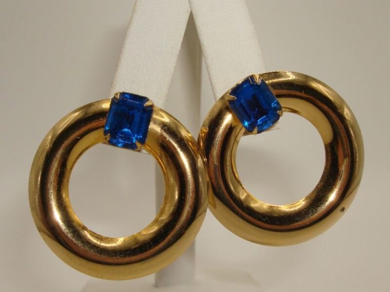 Vintage gold-tone rhinestone hoop earrings with blue glass stones