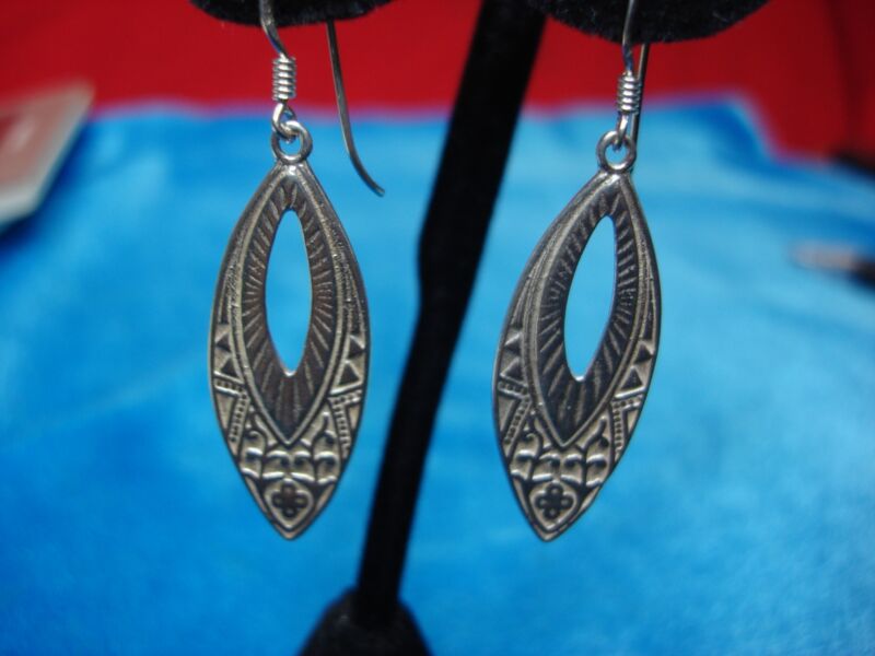 Sterling silver drop earrings with a unique pattern