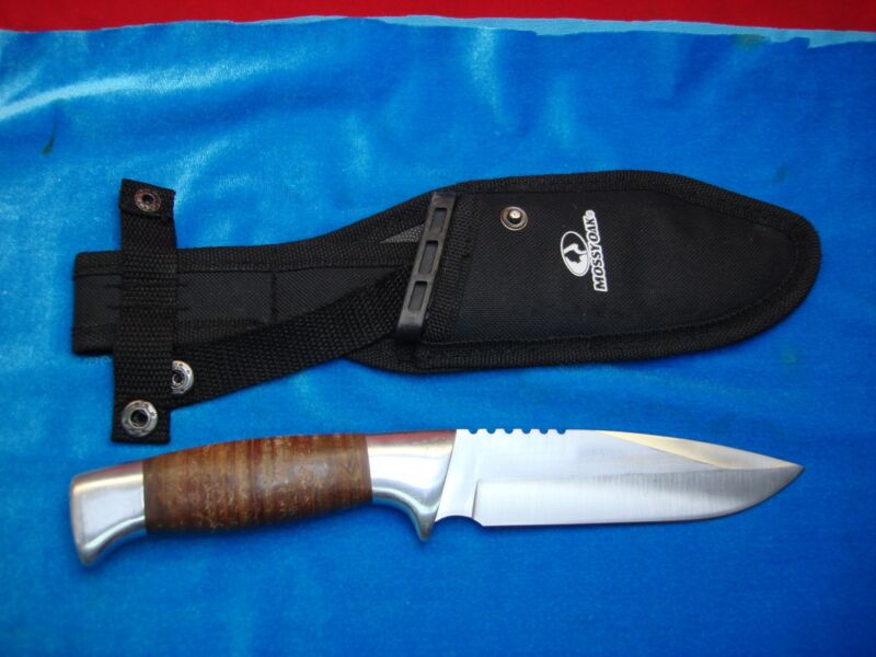 Vintage Mossy Oak stainless steel fixed blade knife with stacked leather grip and original scabbard.
