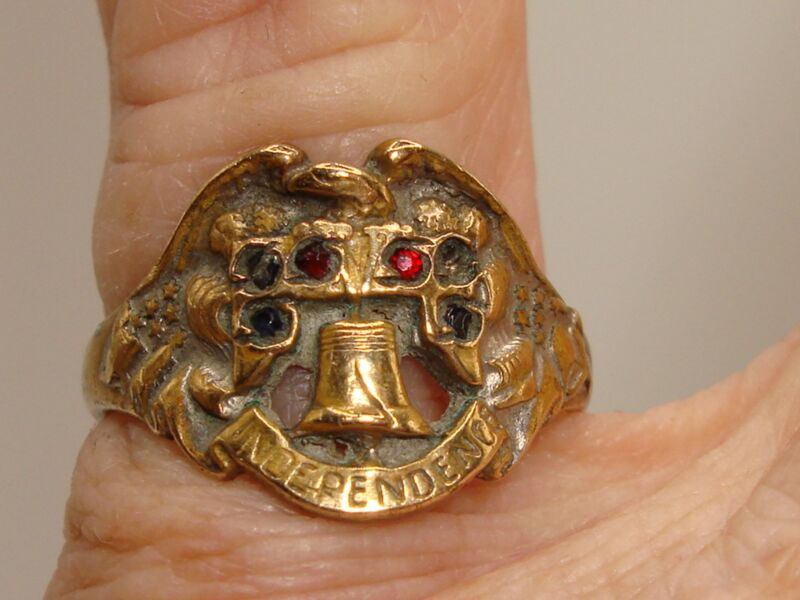 Vintage gold-washed brass Liberty Bell ring with red paste stones, size 6 1/4