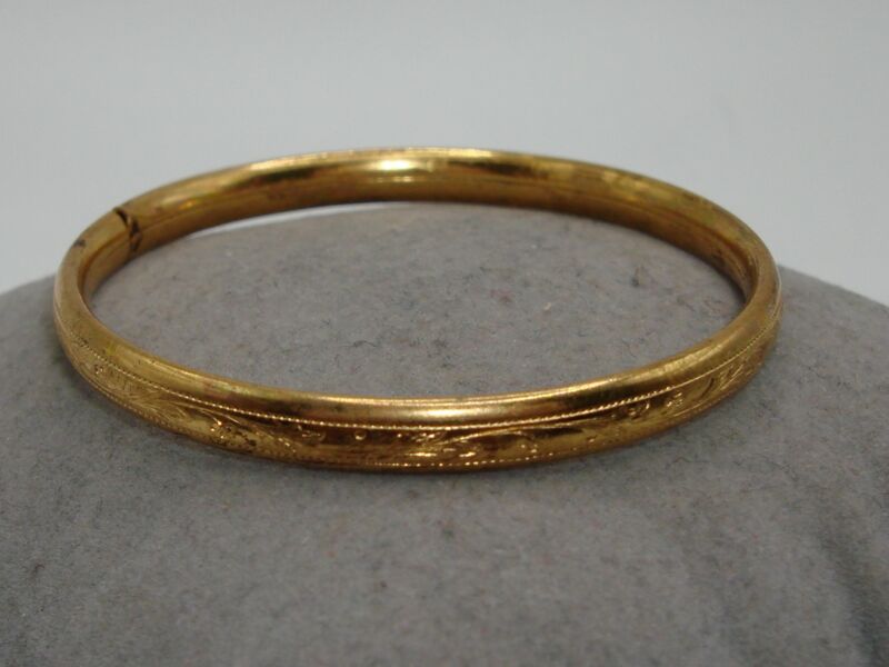 Vintage gold-tone floral child's bangle bracelet