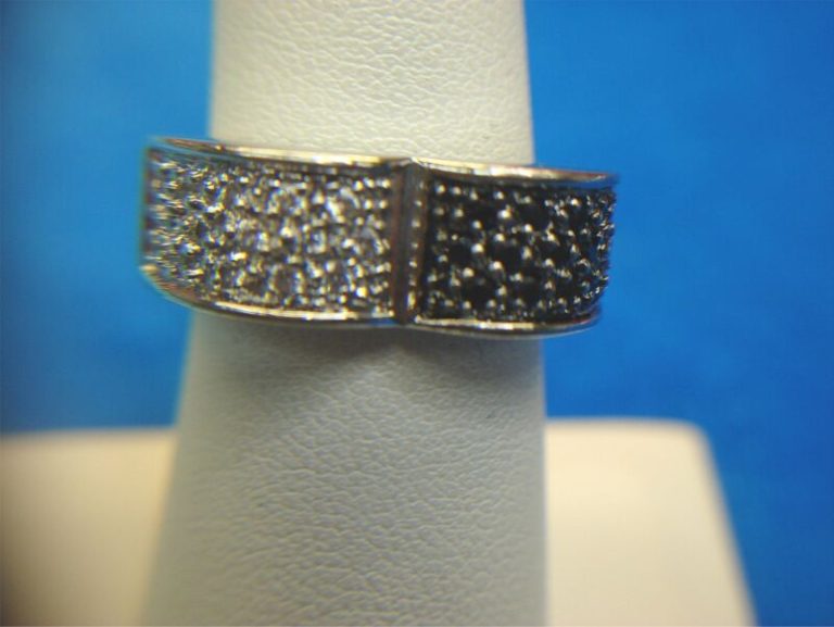 Unique sterling silver ring with black and clear stones, size 6 3/4