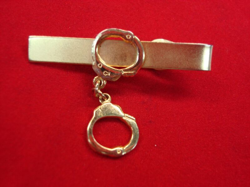 Vintage gold plated handcuff tie clip