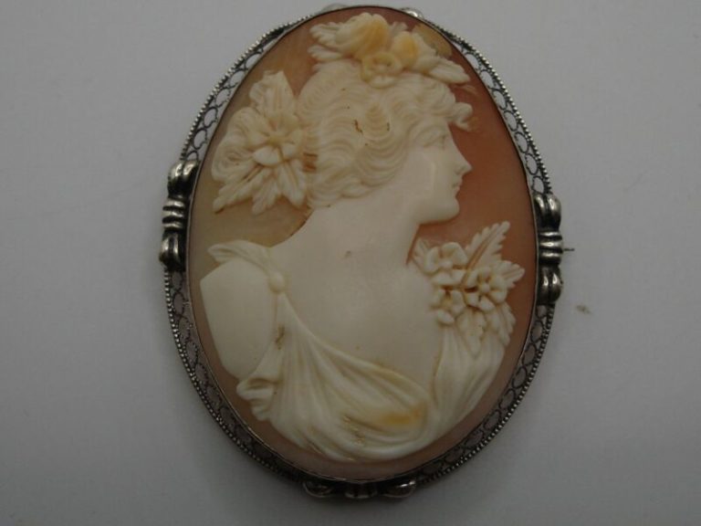 Antique Art Nouveau sterling silver cameo pin with carved shell floral design