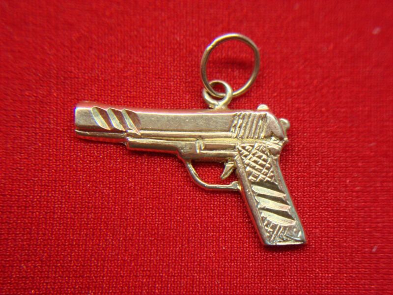 14K yellow gold pistol pendant charm with diamond cut accents