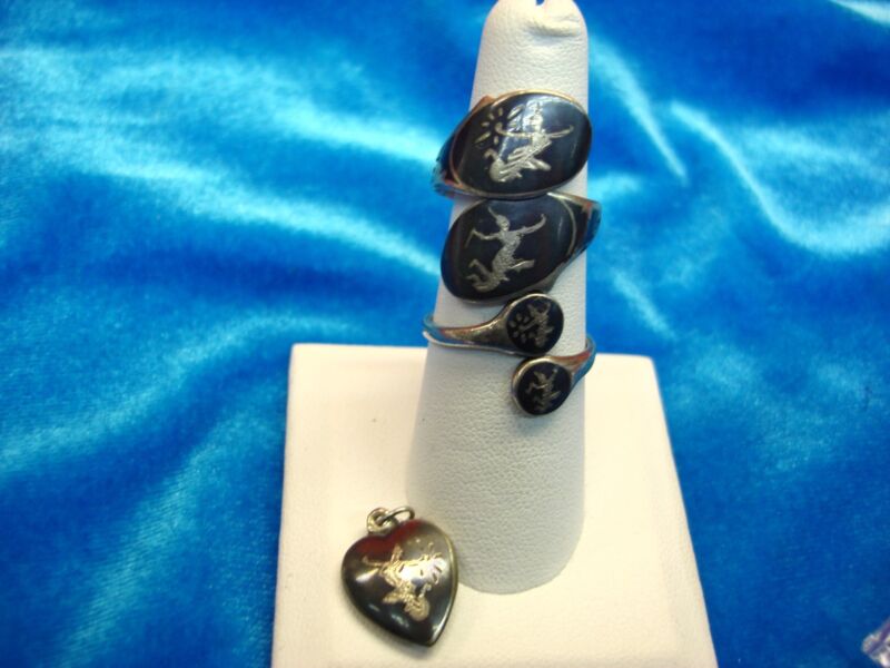 Vintage Siam sterling silver ring set with heart charm