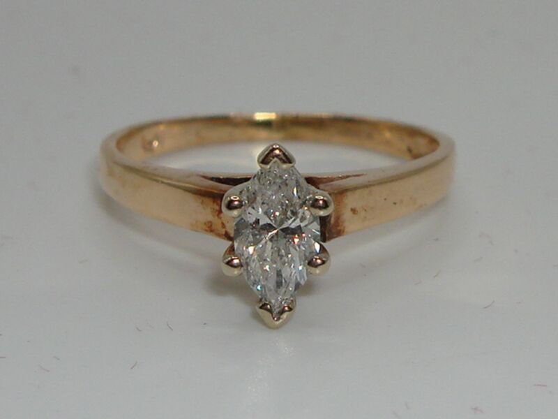 Elegant 14K gold engagement ring with a 1/2 carat diamond, size 6