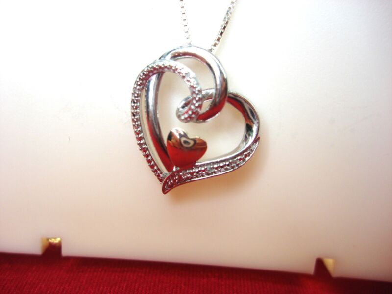 Sterling silver and 10K rose gold diamond heart pendant necklace