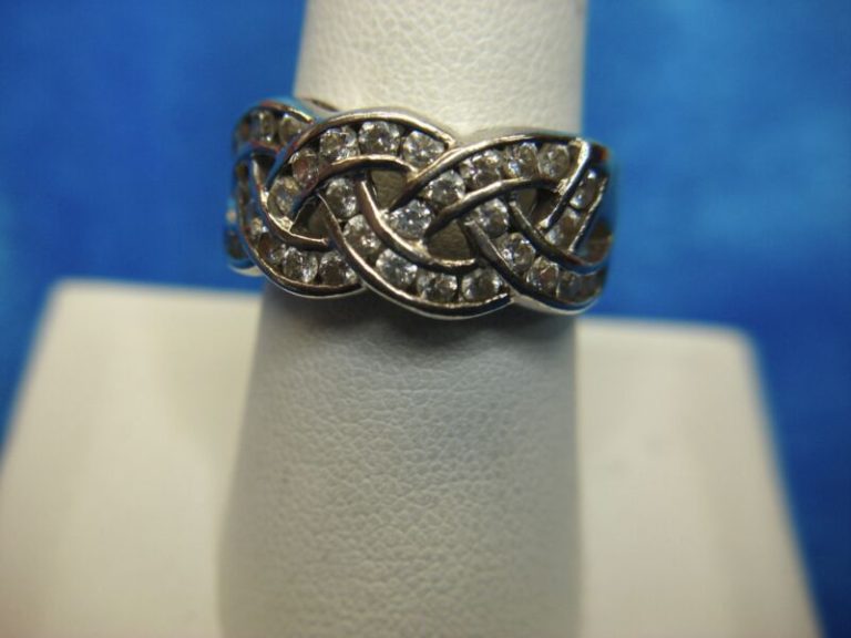 Sterling silver channel set CZ ring, size 8. Pre-owned, excellent condition.