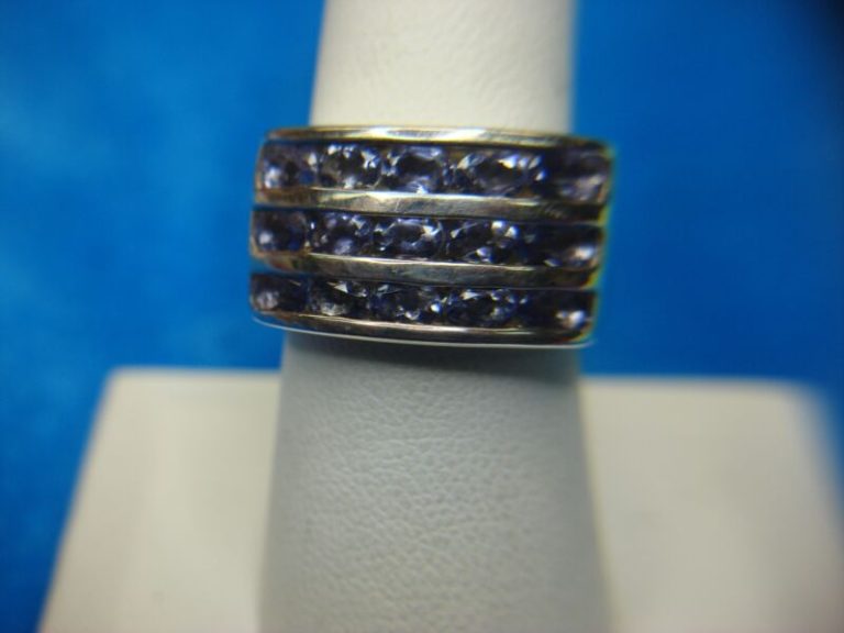 Sterling silver ring with blue channel-set stones, size 8, pre-owned