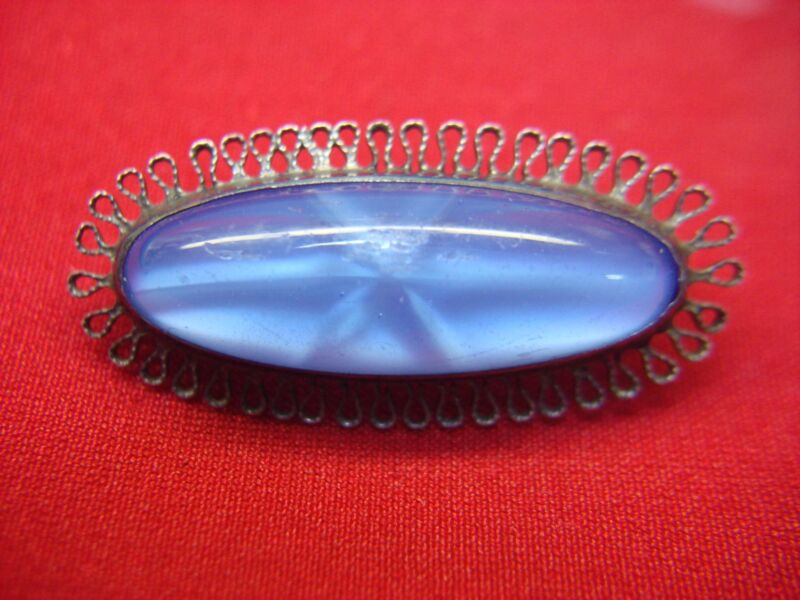 Vintage sterling silver pin with blue star glass