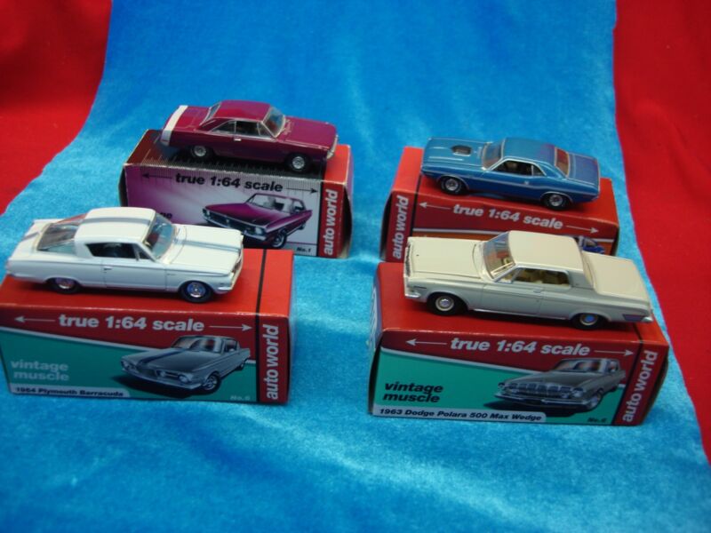 Vintage diecast collection of four Mopar cars in original boxes