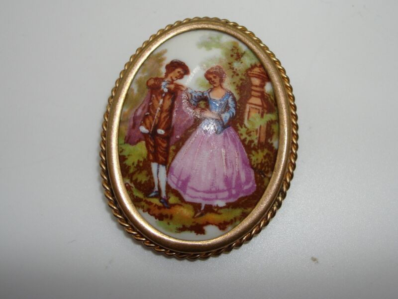 Vintage Limoges porcelain framed brooch with bezel-set portrait and twisted trim