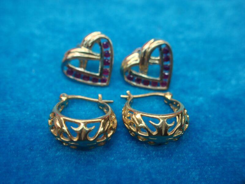 Sterling silver heart earrings set with rubies and cut-out designs (2 pairs)