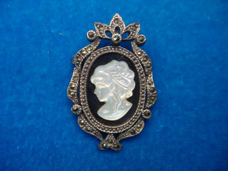 Vintage sterling silver cameo pin & pendant with onyx and mother of pearl, marcasite accent