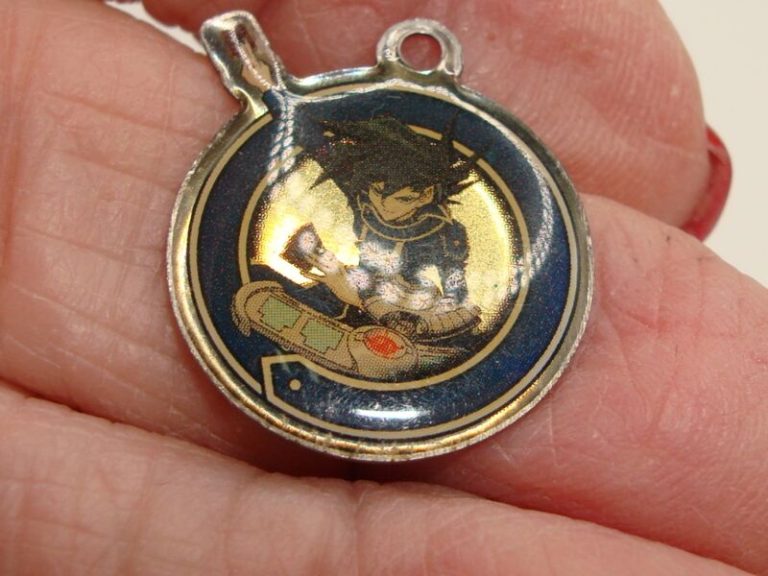 Vintage 2004 Yu-Gi-Oh charm featuring Kazuki Takahashi