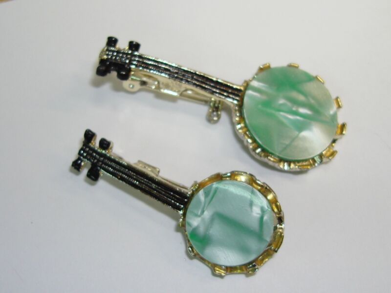 Vintage mother-of-pearl banjo scatter pins