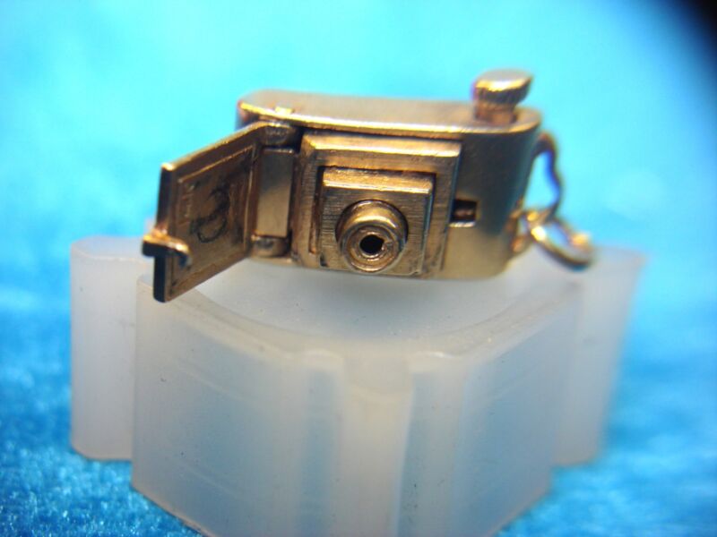 Vintage 14K yellow gold camera charm with functional bellows and shutter button