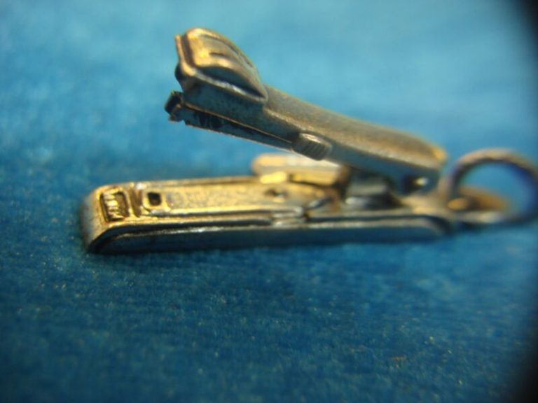 Vintage sterling silver articulated stapler charm