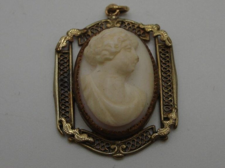 Antique carved shell cameo pendant with filigree, featuring a vintage lady portrait