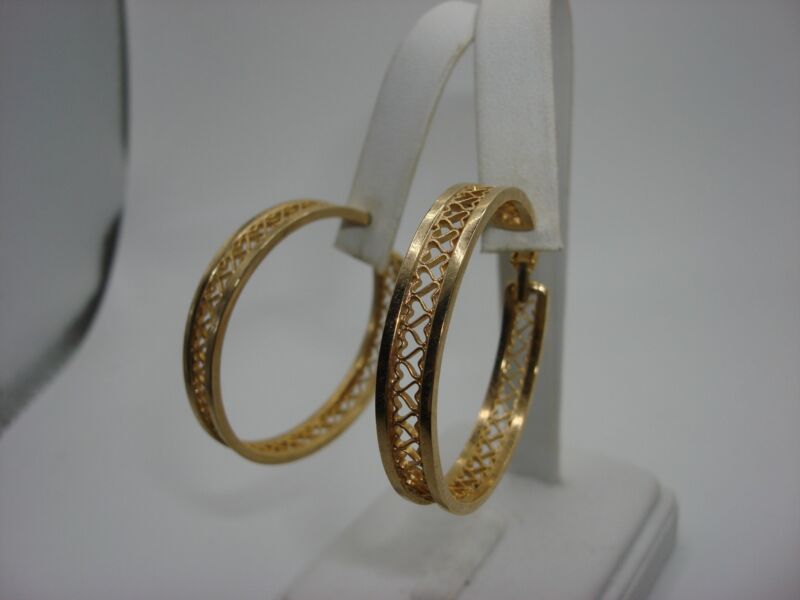 Vintage 1960s-70s gold-tone hoop earrings with filigree hearts