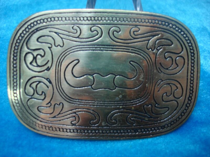 Vintage brass buckle with steer horns, excellent condition