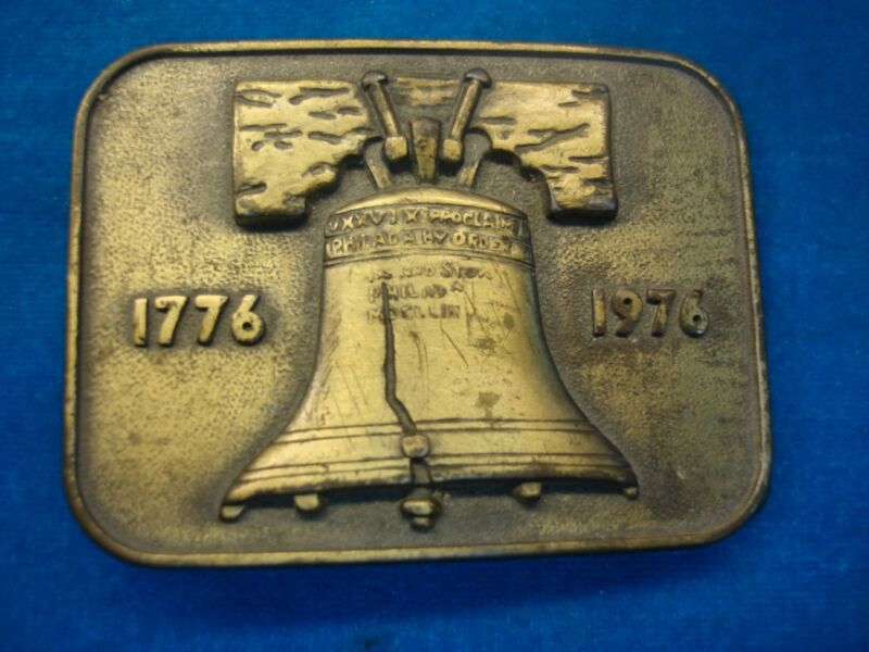 Vintage brass-tone belt buckle featuring the Liberty Bell, celebrating the 1776-1976 Bicentennial