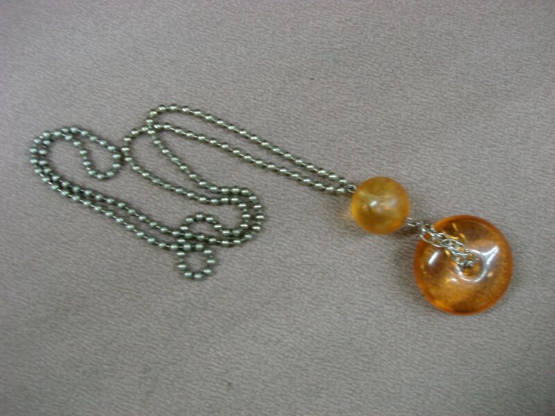 Vintage 1960s-70s orange lucite mod necklace with frosted ball pendant