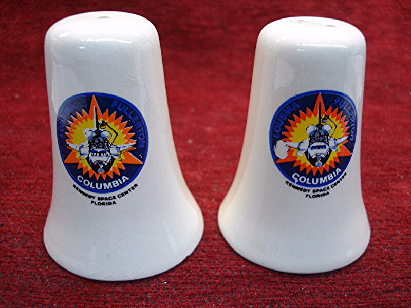 Vintage ceramic salt and pepper shakers commemorating the 3rd flight of Space Shuttle Columbia.
