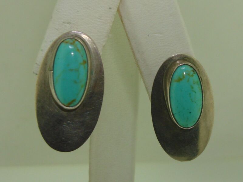 Vintage 1960s Southwestern silver and turquoise earrings with oval design