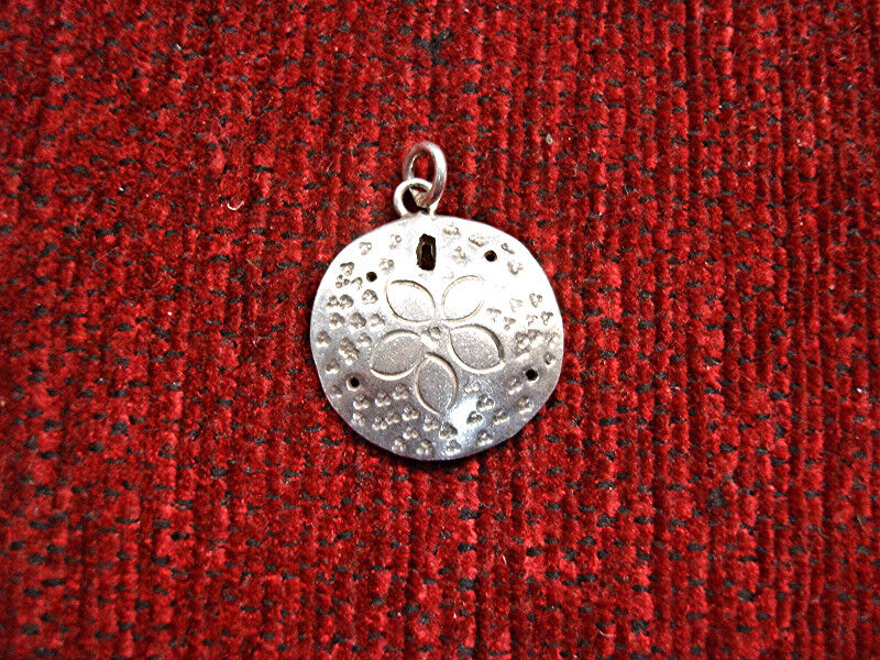 Vintage sterling silver sand dollar charm pendant by Lawton