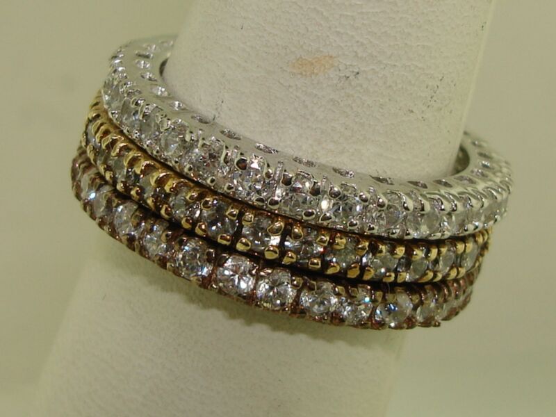 Set of 3 tri-color sterling silver eternity bands with cubic zirconia (size 8.5)