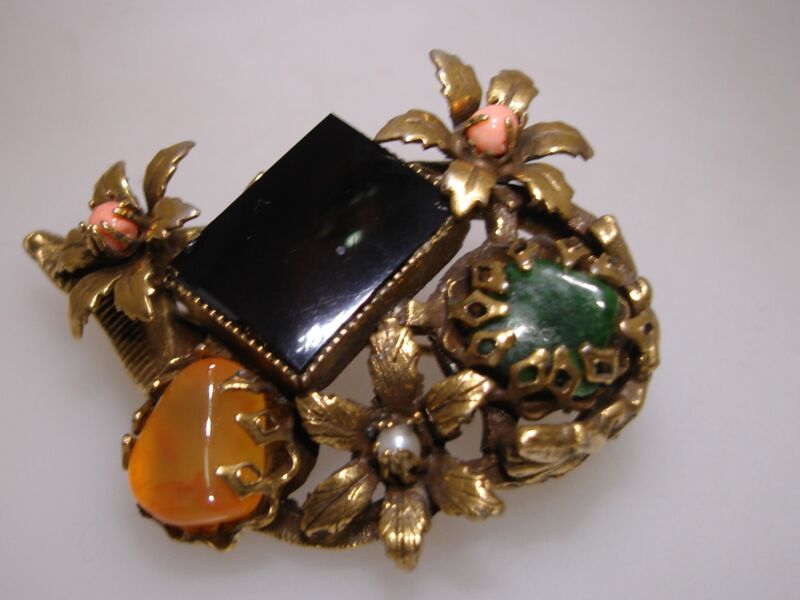 Vintage 1960s gold-tone pin with coral, onyx, jade, and pearl cluster