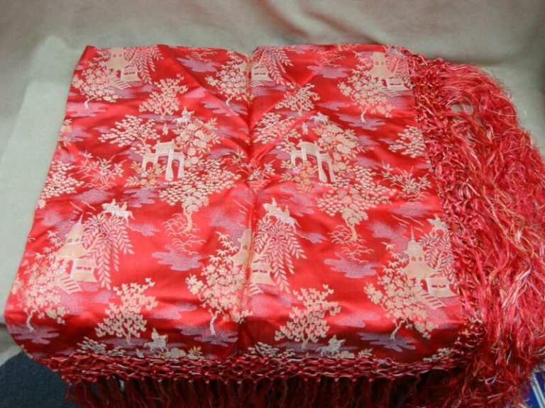 Vintage Japanese piano scarf with red and gold satin design, fringe, and pagoda motifs