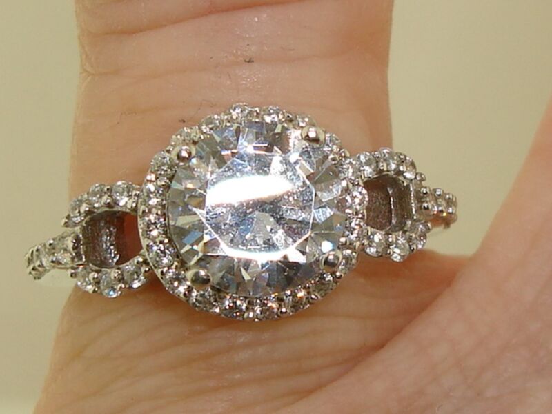 Radiant sterling silver halo ring with cubic zirconia stones and a 1.9ct center stone, size 6