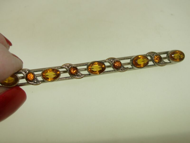 Vintage 1920s-30s silver washed pin with faux topaz gemstones