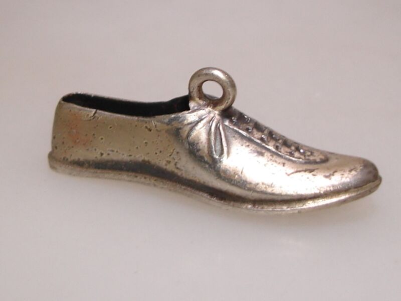 Vintage sterling silver track shoe charm, hallmark BHS-46