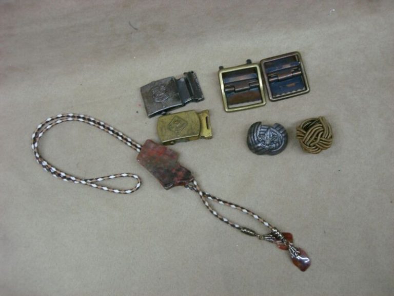 Vintage Boy Scouts of America buckles, slides, and bolo tie from the 1930s to 1970s