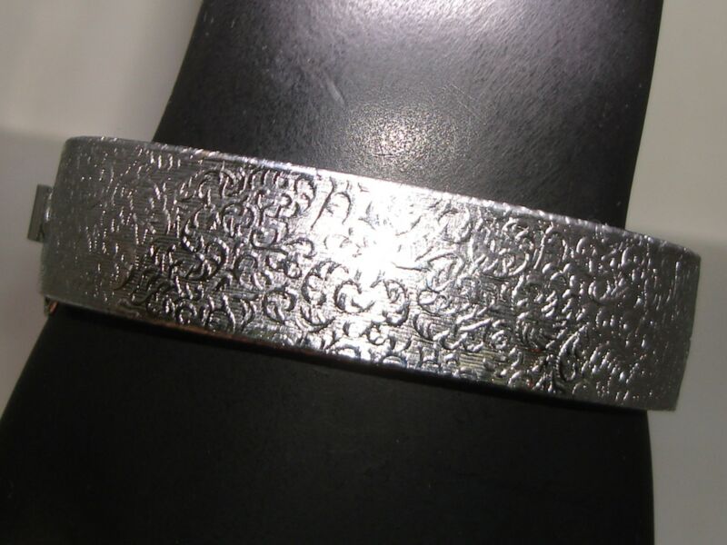 Vintage Art Nouveau silver hinged bangle bracelet with embossed design