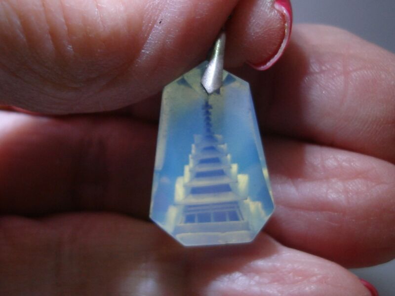 Vintage sterling silver pagoda pendant with reverse-carved blue opal glass