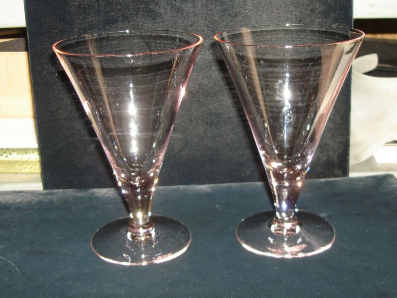 Pair of pink glass champagne flutes