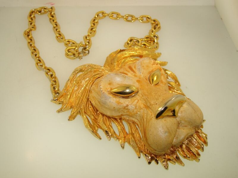 Vintage gold-tone lion pendant necklace, large and detailed, similar to Razzi