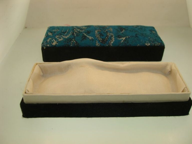 Antique Japanese silk-lined jewelry box with a blue brocade lid