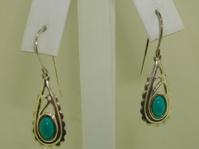 Sterling silver and turquoise dangle earrings with blue cabochon stones