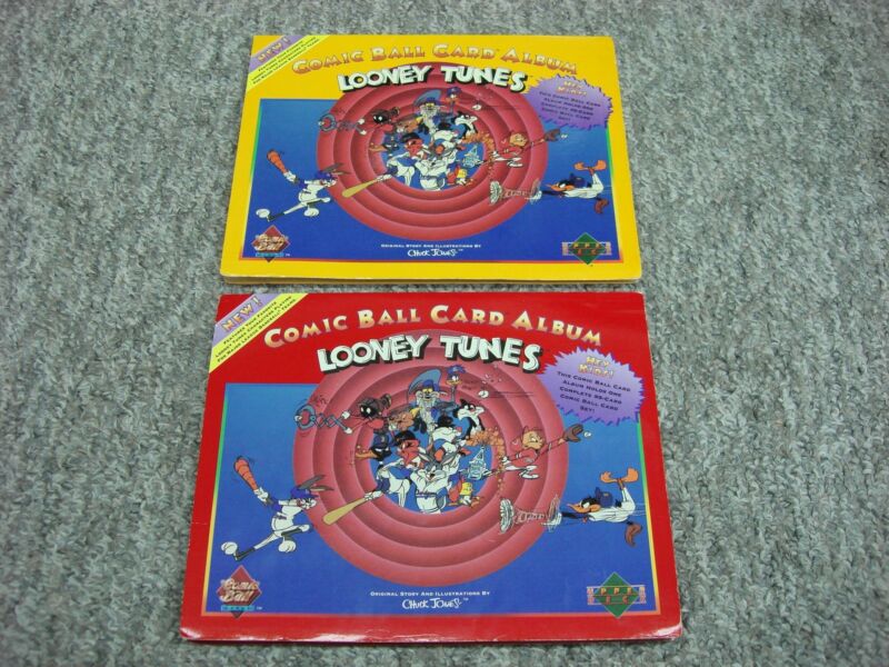 Vintage Looney Tunes comic ball albums and cards from the 1990 Upper Deck series. One album is complete, the other is near-complete.