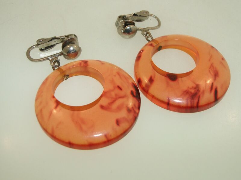 Vintage 1960s amber lucite hoop clip-on earrings
