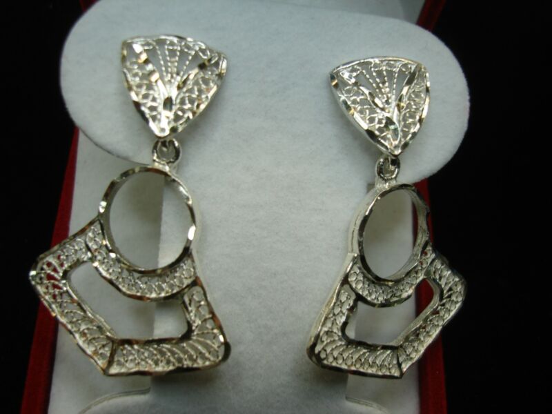 Sterling silver filigree fan earrings with diamond cut accents