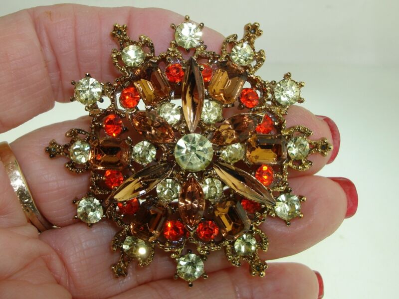 Vintage 1960s foiled rhinestone brooch with rich fall colors and clear stones