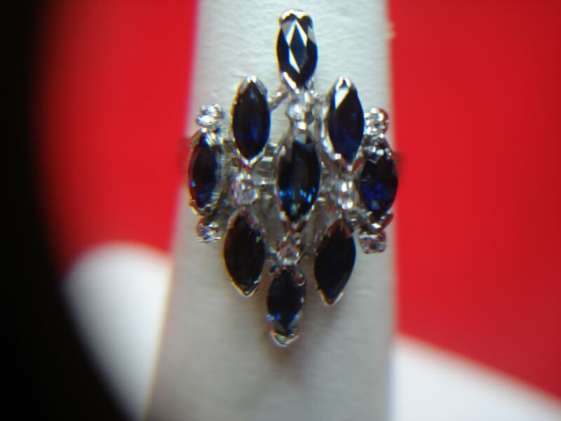 Sterling silver ring with nine marquise-cut blue stones